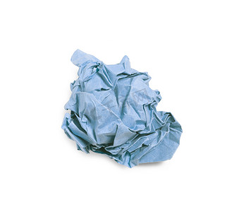 蓝色褶皱纸摄影照片_孤立在白色背景上的皱巴巴的蓝色纸球
