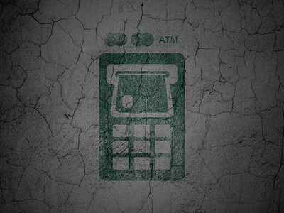 金钱概念： 垃圾墙背景上的 ATM 机