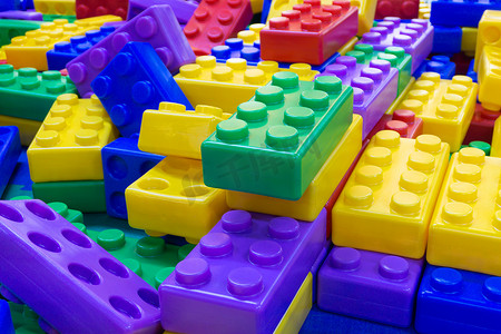 儿童教育概念的大堆塑料玩具积木背景