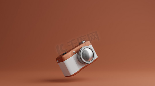camera图标摄影照片_棕色背景摄影概念上的棕色和白色相机