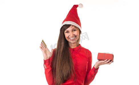 带信用卡和红盒子的圣诞帽女孩