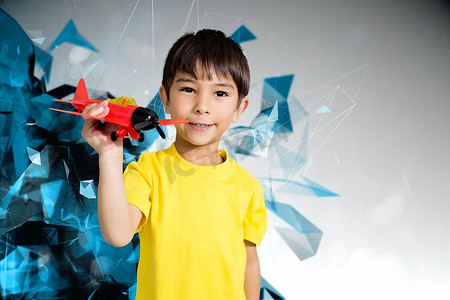 可爱男孩玩玩具飞机的合成图像