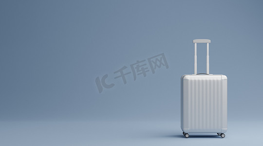在蓝色背景旅行概念的白色行李。 