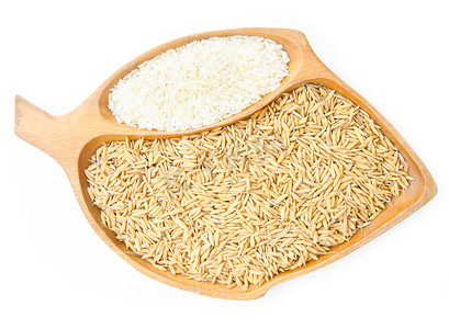 水稻植株摄影照片_木碗中水稻和生米的不同