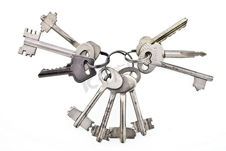 一串钥匙摄影照片_白色背景上的一串钥匙
