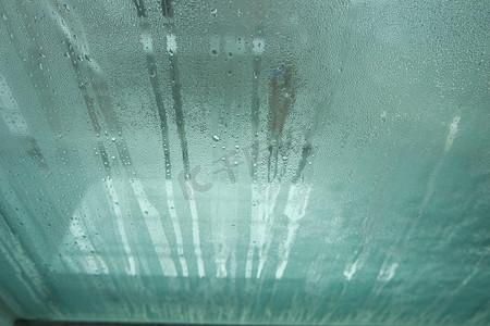 浴室玻璃摄影照片_“明亮的灰色玻璃状纹理和背景摘要”