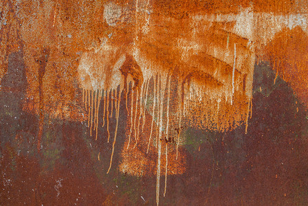 涂有大锈蚀和金属腐蚀的铁表面，以剥落和开裂油漆为背景的旧背景，橙色质地