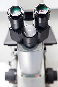 教育立体摄影照片_实验室立体显微镜目镜的特写