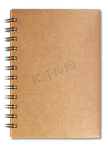 教育摄影照片_孤立在白色背景上的棕色笔记本