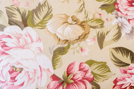 五颜六色的复古挂毯纺织图案与花卉的片段。