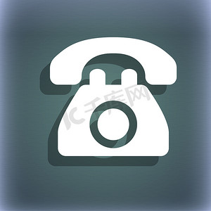 复古电话图标摄影照片_蓝绿色抽象背景上的复古电话图标符号，带有文本的阴影和空间。