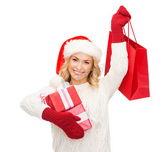 带着购物袋的圣诞老人助手帽的女人