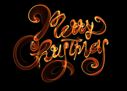 黑色火光摄影照片_圣诞快乐孤立的文字刻字用火焰火光写在黑色背景上。