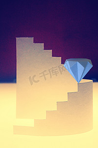 星星纸雕摄影照片_带楼梯和钻石的纸组合物
