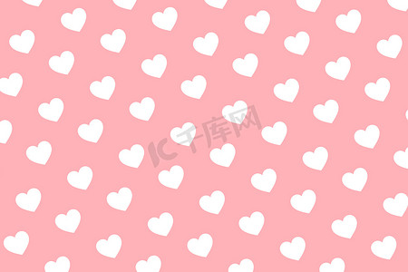 情人节背景与粉红色背景上的白心装饰。