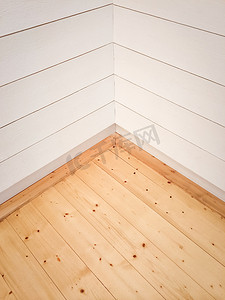 室内木地板摄影照片_带木地板的空房间角落