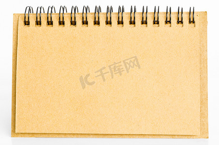 黄黑日记本摄影照片_由回收纸制成的棕色日记本。