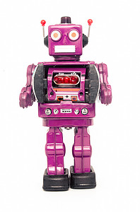 站立的机器人摄影照片_金属机器人玩具站立