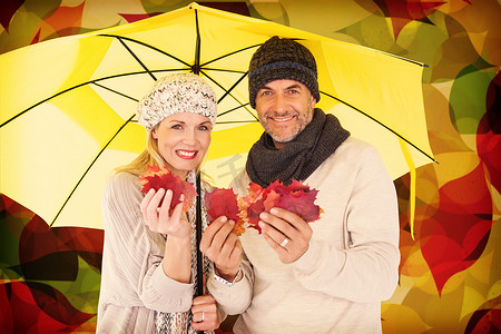 黄伞下手持秋叶的情侣肖像合成图