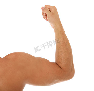 人强壮摄影照片_肌肉发达的手臂