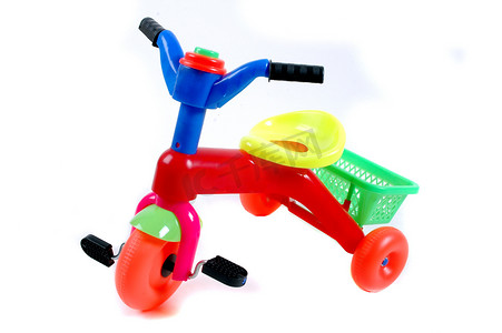 三轮车摄影照片_儿童自行车塑料玩具