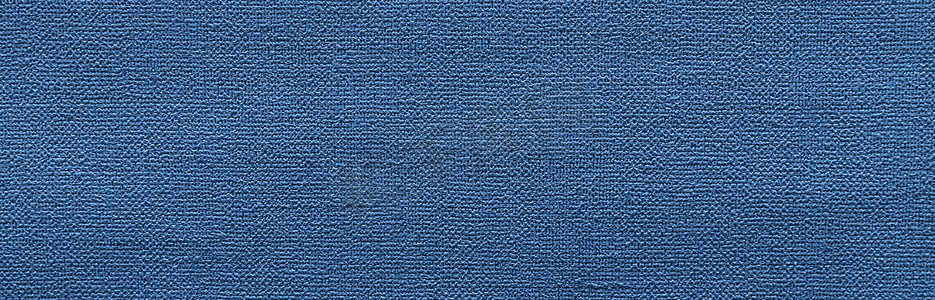 杂色纹理摄影照片_呈杂色的蓝纸纹理，可用于背景
