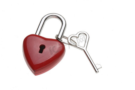 信物摄影照片_微小的心形锁，挂锁，作为爱心锁，带钥匙和心形手柄