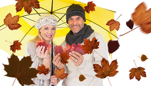 黄伞下手持秋叶的情侣肖像合成图