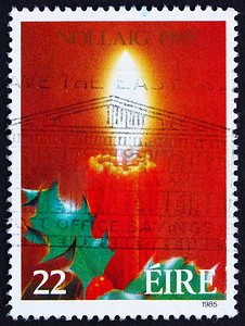 圣洁摄影照片_邮票爱尔兰 1985 年蜡烛和圣洁，圣诞节