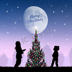 装饰的月亮摄影照片_圣诞树周围的孩子们
