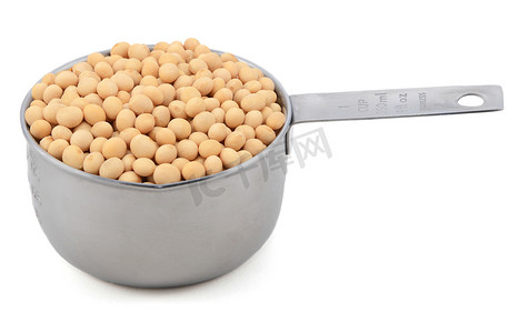 测量杯摄影照片_量杯中的大豆或黄豆