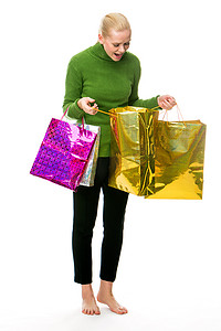 游戏礼包盒摄影照片_为圣诞节购物的女人