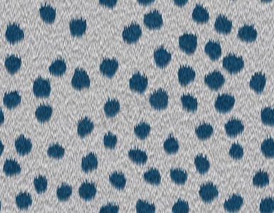 皮肤斑点摄影照片_带蓝色斑点的浅灰色猎豹毛，短毛