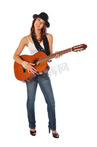 有魅力的女人在白色的吉他