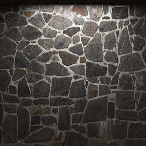 斑点背景摄影照片_发光的石墙