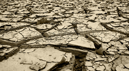 淤泥摄影照片_昆士兰发生大洪水后干涸的泥土和河流淤泥