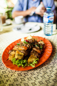 坐佛摄影照片_柬埔寨烧烤的传统牛肉串
