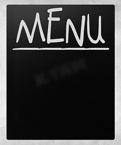 白色粉笔摄影照片_带有白色粉笔污迹的空白黑板使用了餐厅菜单