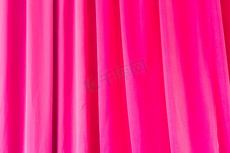 古典文化纹理摄影照片_用于背景的粉红色窗帘纹理