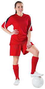 红色可爱摄影照片_可爱的足球运动员站着球