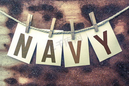 海豹突击队摄影照片_NAVY Concept 将印花卡片固定在麻线主题上