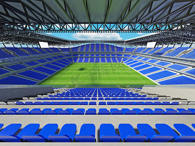 有蓝色位子和贵宾包厢的大美丽的现代足球场