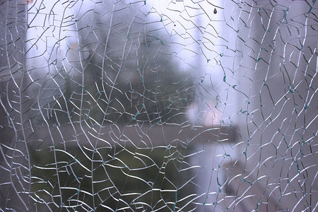 破碎的玻璃摄影照片_破碎的玻璃抽象背景