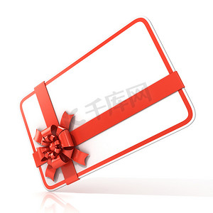 礼品装饰红丝带摄影照片_白色空白礼品卡，用红丝带。 