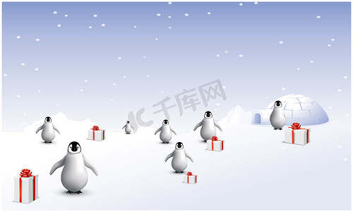 几只企鹅在雪中带着礼物