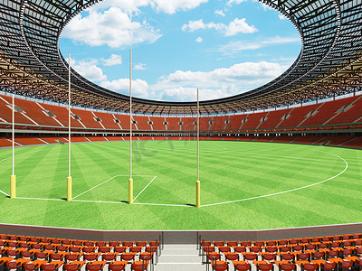 美丽的现代圆形澳式足球场，设有橙色座椅和贵宾包厢