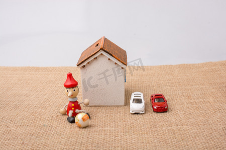 皮诺曹摄影照片_画布上的小模型房子