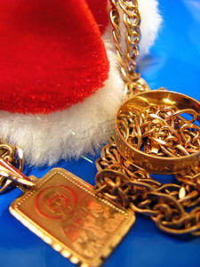 新年礼物，金色，深蓝色背景，链子，戒指，圣诞节