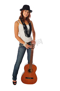 有魅力的女人在白色的吉他