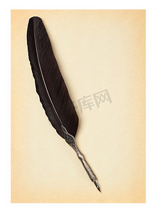 黑色毛笔摄影照片_旧纸上的羽毛笔
